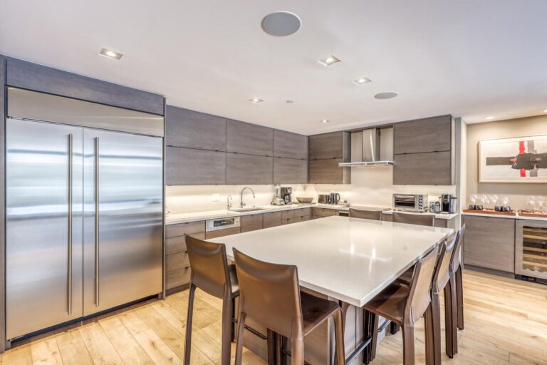 Kitchen featuring High End Appliances, Island Seating 